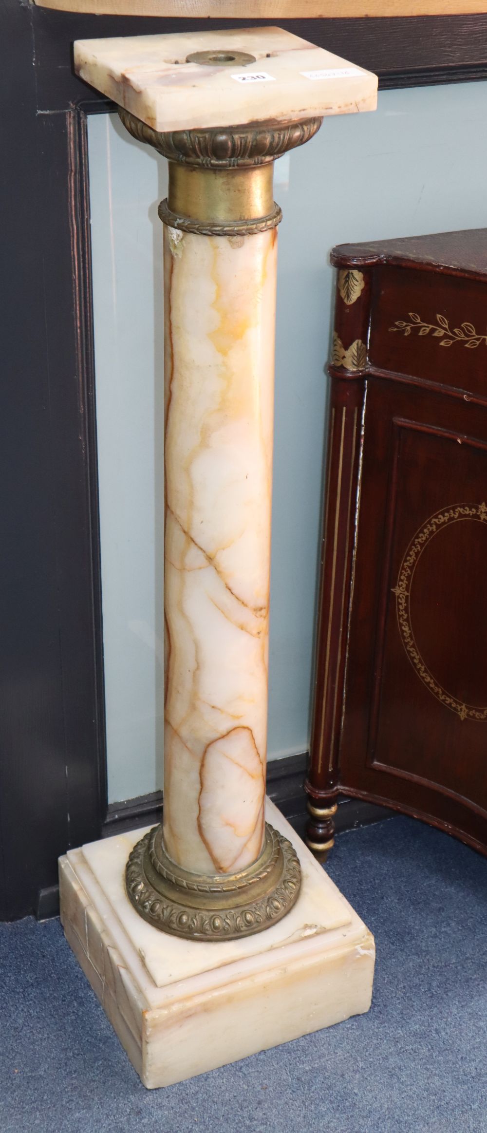 A pair of onyx pedestals, H.103cm